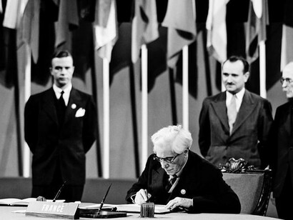 Joseph Paul-Boncour, former Prime Minister and member of the delegation from France, signing the UN Charter at the Veterans' War Memorial Building, San Francisco, United States, 26 June 1945.UN Photo/McCreary