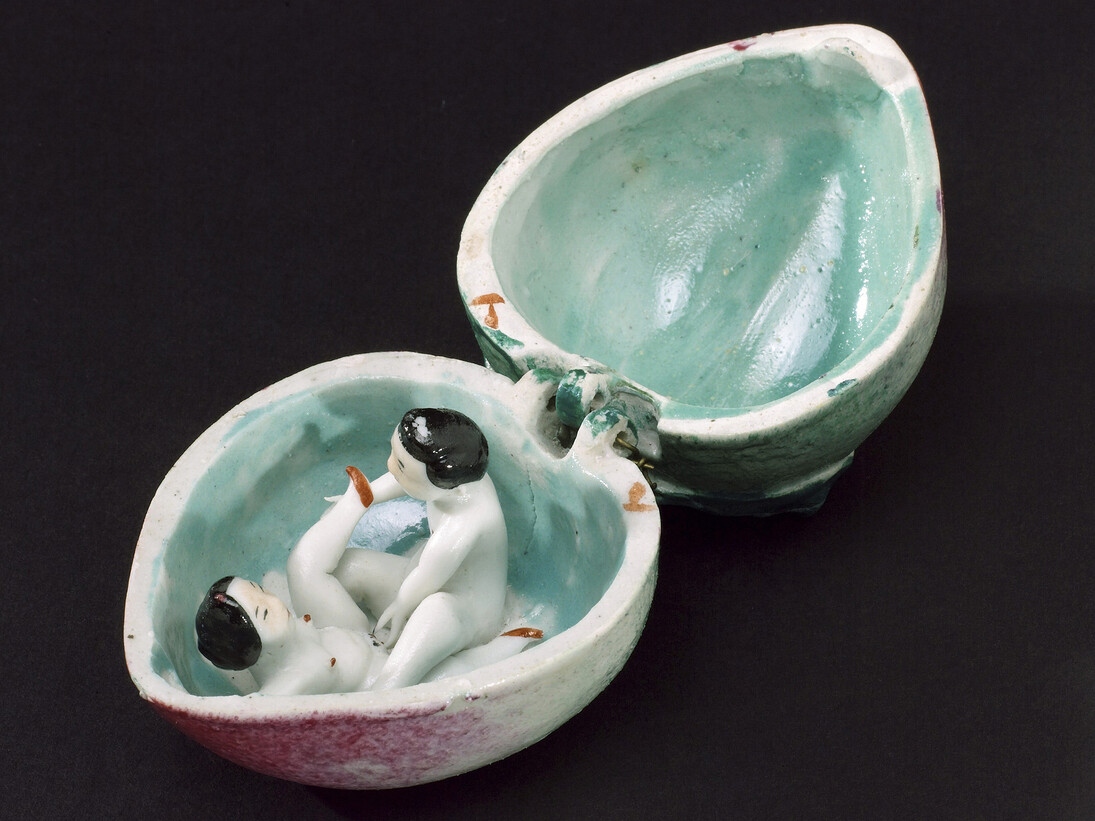 Porcelain fruit, hinged, contains male and female copulating, Courtesy of Science Museum / Science and Society Picture Library