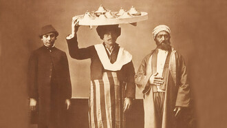 Studio portrait of models wearing clothing from İstanbul, Ottoman Empire