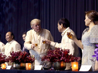 President Rodrigo Roa Duterte proposes a toast during the gala dinner hosted by the Philippines for the leaders of the Association of Southeast Asian Nations (ASEAN) member states and dialogue partners at the SMX Convention Center in Pasay City on November 12, 2017