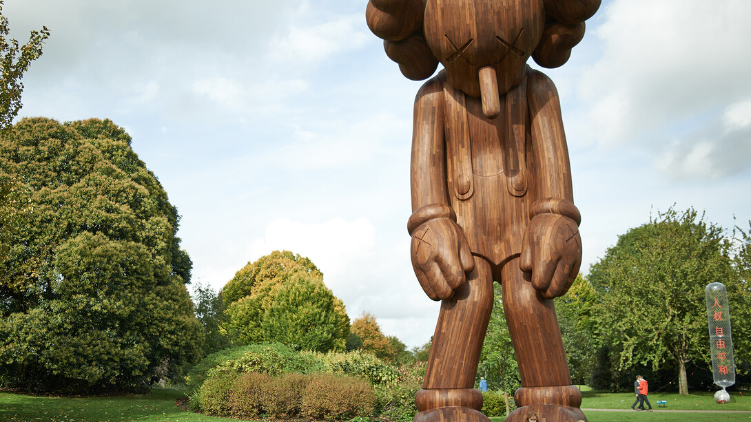 KAWS, SMALL LIE (2013), Afromosia, H1000cm x W464cm x D427.2cm, courtesy the artist and YSP
