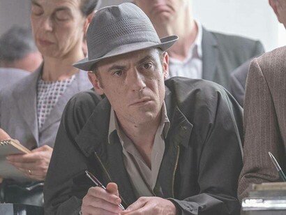 Elio Germano in the middle of a tense scene from Lord of the Ants (2022) 