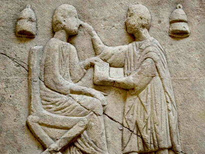 Rilievo romano raffigurante un "medicus dentium" (odontoiatra)