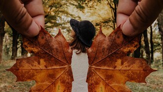 Leaves being used as wings to creatively give the person the power of flight