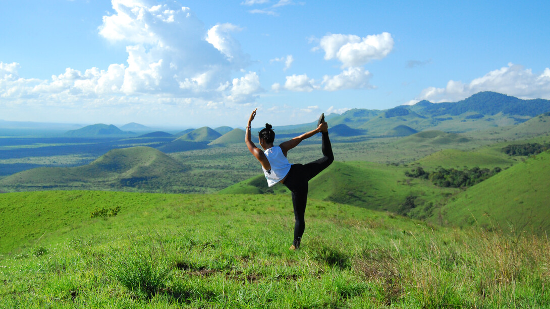 Yoga Instructor, Tricia Cruz practicing at Campi Ya Kanzi
