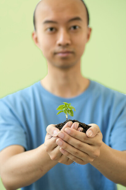 A plant grows despite challenges and setbacks