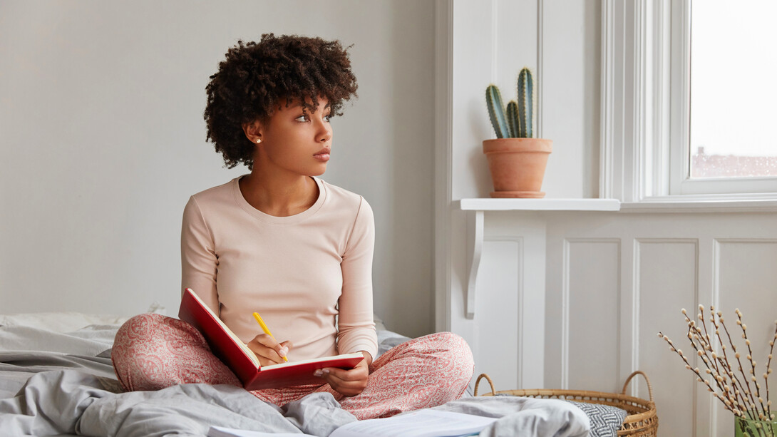 Starting the day with intention, she writes in her journal to clarify her goals and set a positive tone for what lies ahead