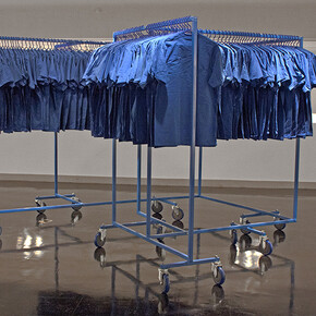 Mike Calway-Fagen, What’ll we do about names, 2014, T-shirts, hangers, steel, wheels, hardware