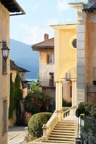 Charming Italian facades and historic properties along narrow lanes in old towns, featuring cozy courtyards, traditional homes, elegant estates, and picturesque views like those around Lake Orta — evoking the romance of Italy’s 1-euro house opportunities
