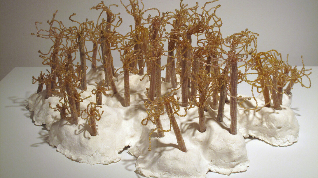 Rachel Abrams, Biological Accumulations (Potentiators), 2009, cast recycled paper glass beads, copper wire, heat shrink tubing, 11” x 21.5” x 16.875”