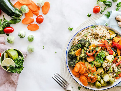 A vibrant vegetable salad on a plate not only showcases a delectable and nutritious option for a healthy diet but also underscores its potential role in cancer prevention and overall wellness
