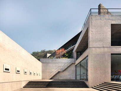 Benesse Museum Hotel, Japan illustrates minimalist architecture, with expanses of concrete, glass and wood