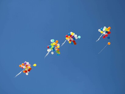 Balloons and confetti are the traditional accompaniment for celebrations 