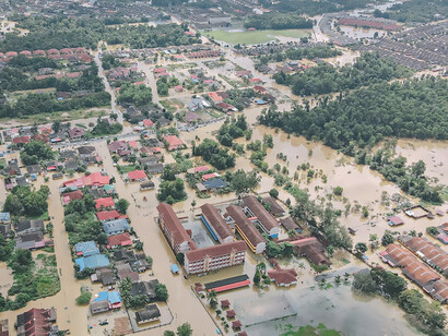 The poignant scene of flooding in Kijal, Terengganu, Malaysia, where the force of rising waters paints a vivid picture of the challenges faced in the region