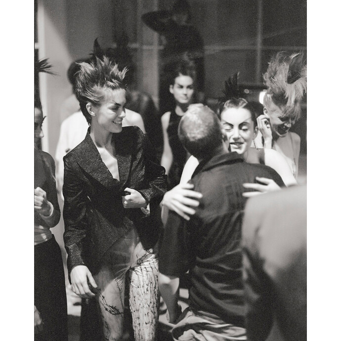 Honor Fraser congratulates Lee after the SS show The Hunger, Natural History Museum, 1996; Image Courtesy of Proud Galleries © Gary Wallis