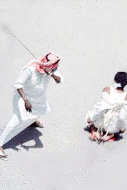 Man flogging captive in Saudi Arabia