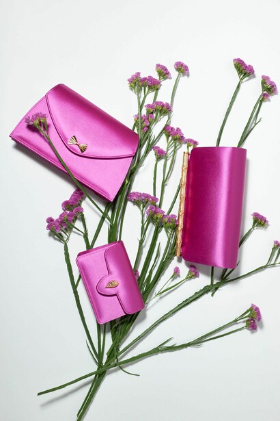 Selezione di pochette da sera in raso di seta fucsia
