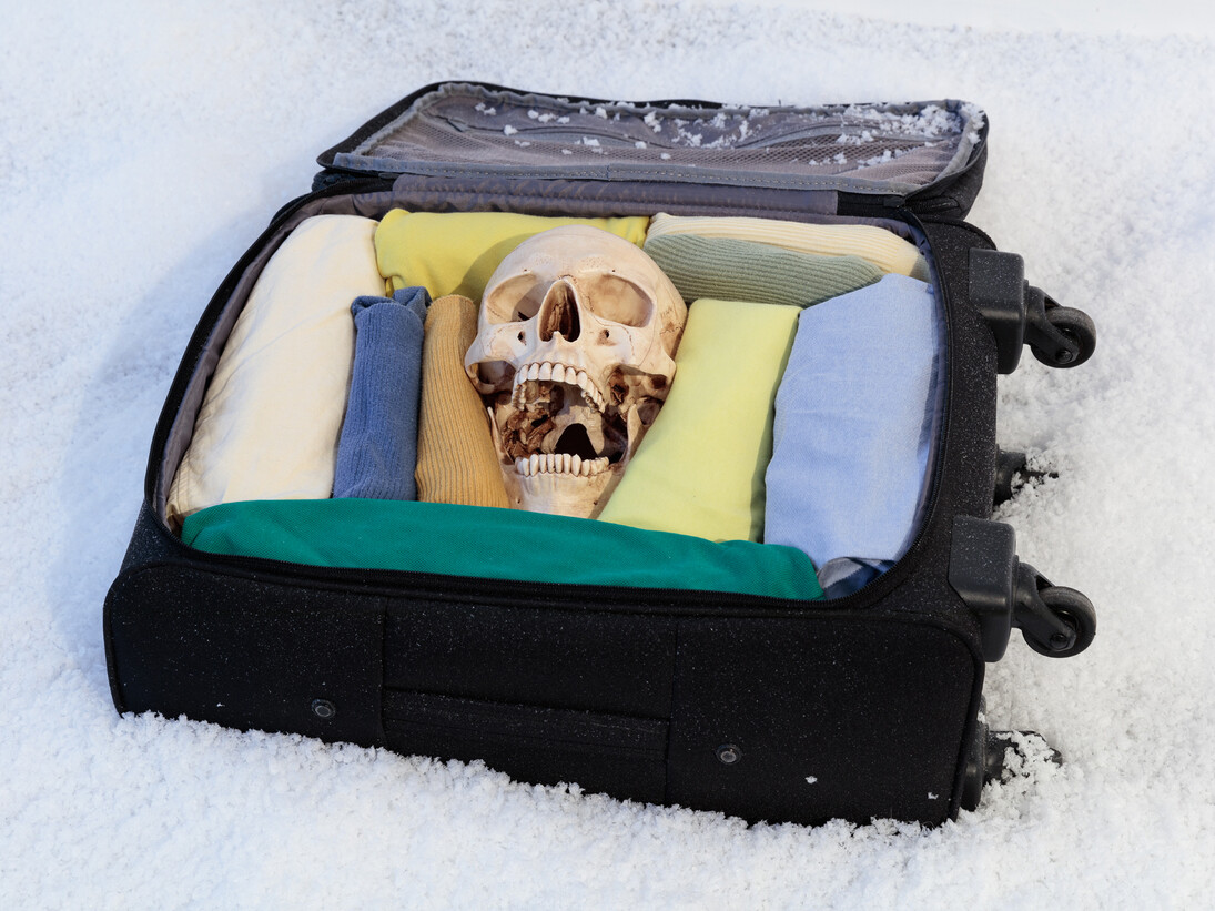 Baggage (Carry On), 2015, artist and fiancé’s clothing, artificial skull and crossbones, artist’s carry on suitcase, 55 x 66 x 19 cm, 21 5/8 x 26 x 7 1/2 ins, courtesy of Vilma Gold, London and Neue Alte Brücke, Frankfurt