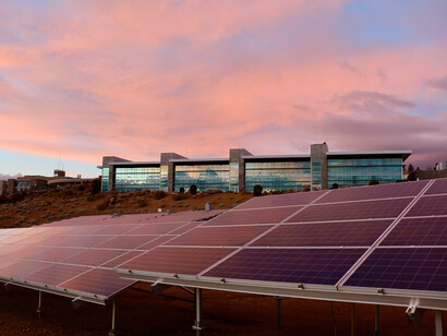 Businesses using solar power panels for clean energy