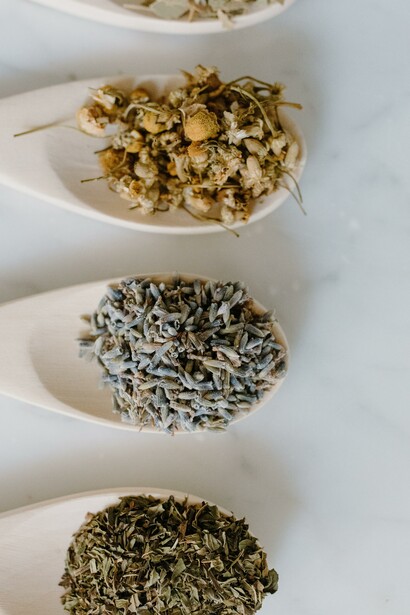 Herbal medicines on wooden spoons