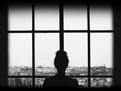 A woman feeling alone in a connected world