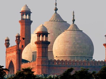The Badshahi Mosque (Punjabi: شاہی مسجد; Urdu: بادشاہی مسجد) is an iconic Mughal-era mosque in Lahore, Punjab, Pakistan. Built between 1671 and 1673 during the reign of Emperor Aurangzeb, it stands opposite the Lahore Fort at the northern edge of the historic Walled City