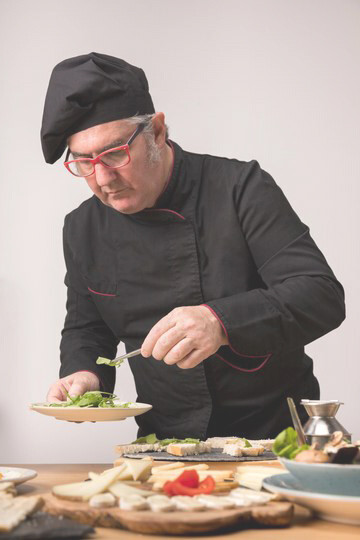 Chef at work, mastering European cuisine with food pairing, sensory dining, and molecular gastronomy
