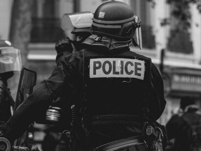 A black and white photo of a group of police officers