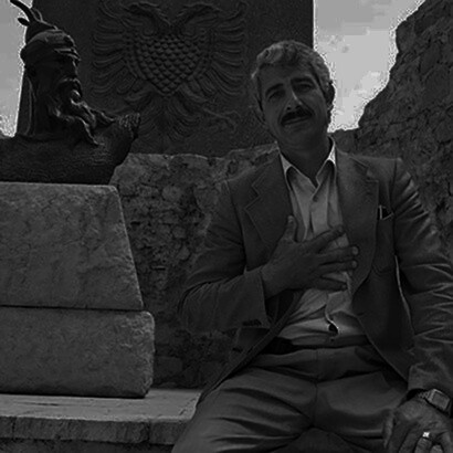 Enver Alia Sheqer, son of Ali Sheqer Pashkaj, with the statue of Albania's national hero Skanderbeg, ph. Norman H. Gershman