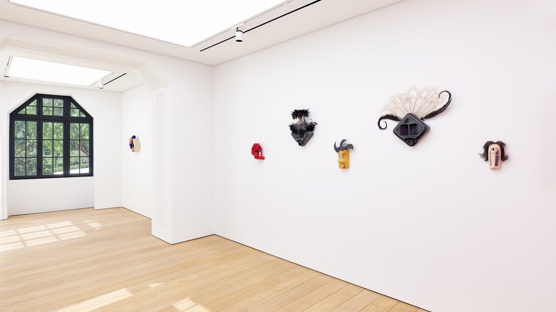 Romuald Hazoumè, Les fleurs du mâle, exhibition view. Courtesy of Gagosian