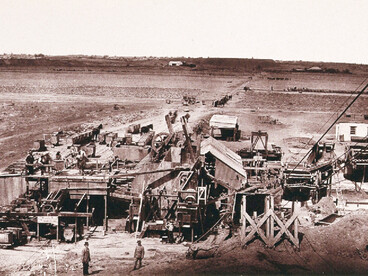Washing equipment and floors at the Kimberley Mine, Kimberley, South Africa. Woodburytype, 1888, after a photograph by Robert Harris