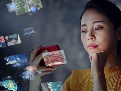 A young woman stays updated on her phone, encountering political deepfakes, AI-driven fake news, and disinformation campaigns