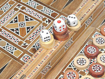 Backgammon set adorned with intricate Khatam Kari patterns and featuring two dice