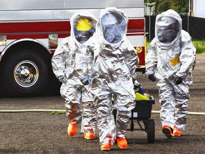 A medical team moving an Ebola victim