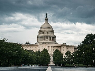 A foreboding sky hanging over the Capitol, reflecting the nation's search for moral and political renewal