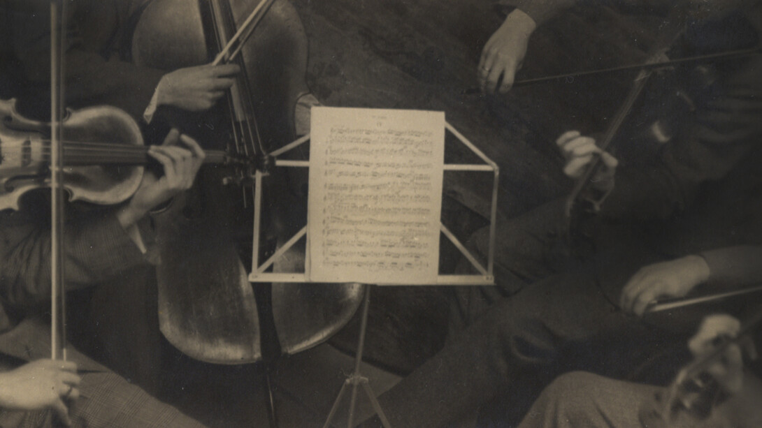 André Kertész (1894-1985), Quartet, 1926, gelatin silver print, printed c. 1926, 3x5 5/8 inches. Signed and dated '1927' in pencil with the photographer's '75 Boulevard Montparnasse, Paris 6' studio and copyright stamps, and National Gallery of Art exhibition label on verso. Courtesy of Bruce Silverstein Gallery
