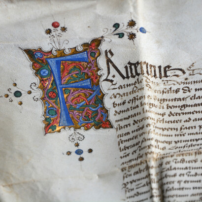 Diploma di Federico III di Asburgo, Imperatore del Sacro Romano Impero, relativo ai possessi feudali della Famiglia Balliano (1469), Pergamena con sigillo, iniziale miniata (ASAL, Archivio Callori, 4)