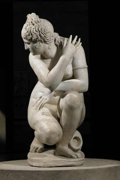 Marble statue of a naked Aphrodite crouching at her bath, also known as Lely’s Venus. Roman copy of a Greek original, 2nd century AD. Lent by Her Majesty the Queen
