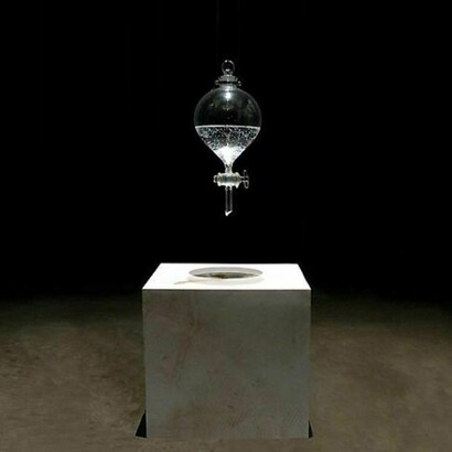 Dove Bradshaw, Waterstone, 1996 to present, Limestone, separatory funnel, water, Limestone: 12 x 12 x 12 inches; 1000 ml separatory funnel