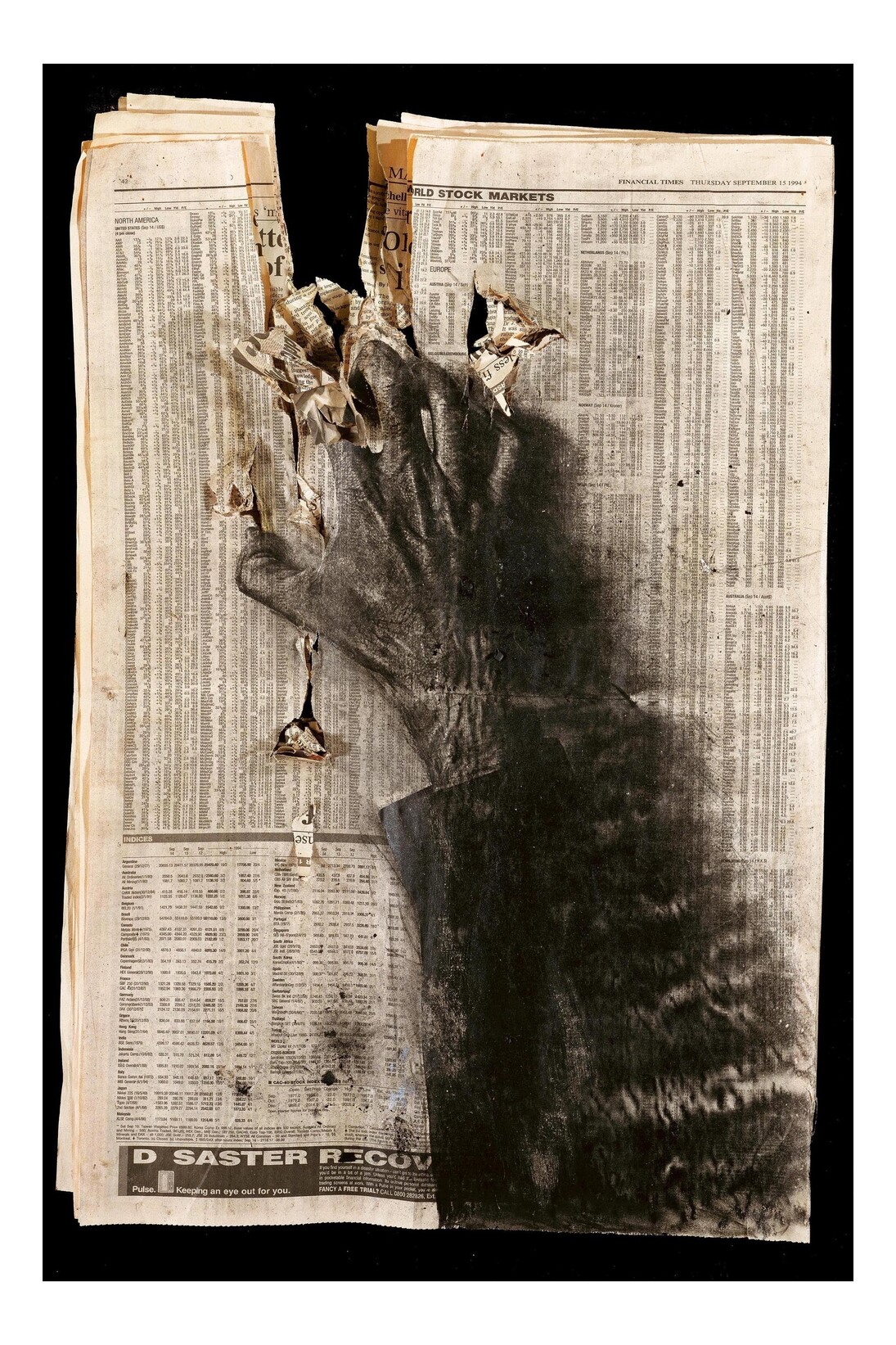Peter Kennard, Newspaper 8 (1994), carbon toner, oil, charcoal, pastel on newpaper, wood, 80 x 58 x 10 cm © Peter Kennard 