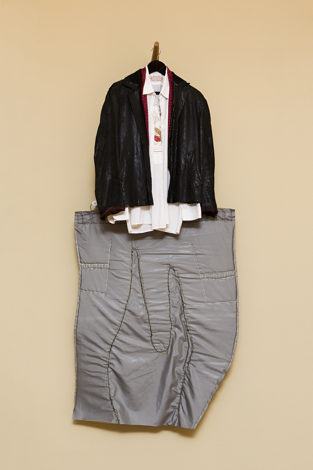f.marquespenteado, Adornar Javier, 2011/2014, synthetic cotton shirt with hand and machine embroidery, leather coat, silk, scarf, foam volume covered by PVC hand and machine embroidery, buckles and hanger, Edition: N/A, 97 x 62 cm / 110 x 81 cm. Courtesy of Mendes Wood DM, São Paulo