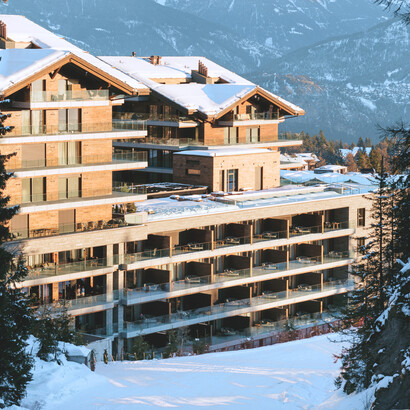 The Six Senses Crans-Montana hotel sits on a plateau above the Rhône Valley in southwestern Switzerland