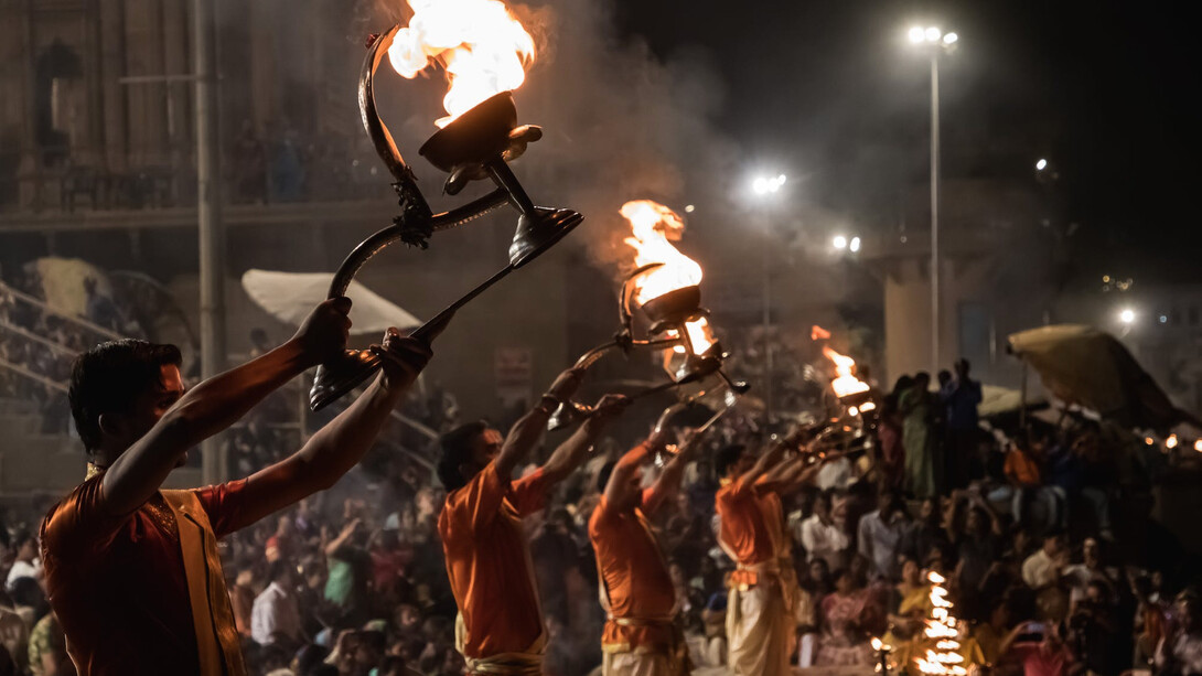 People holding torches in Dasaswamedh, UP, India