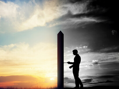 A man looks at his dark future or his light future