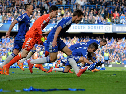 Players run to celebrate victory