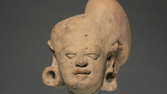 An eastern Java, Majapahit Dynasty, female head from 1978 present in Sonobudoyo Museum, Yogyakarta, Indonesia 