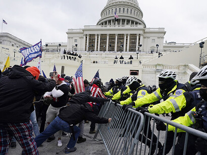 The violent storming of the Capitol by a Trumpian mob 
