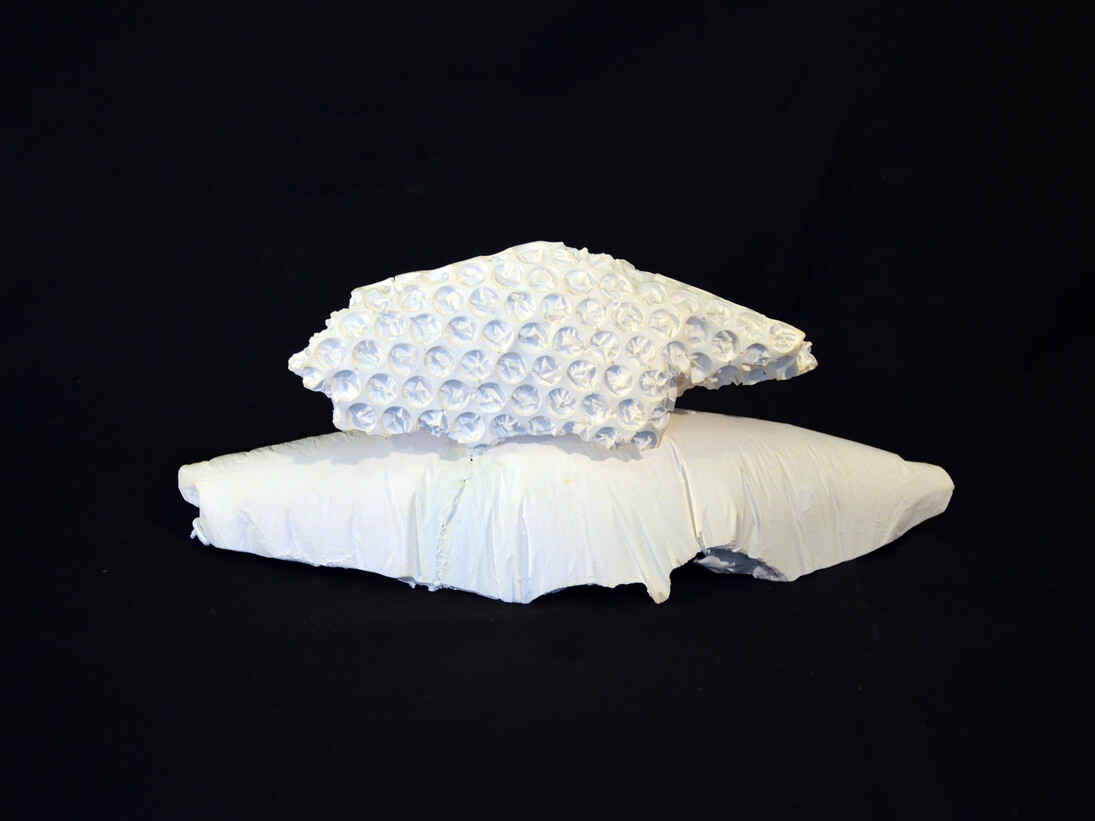 Kara Rooney, On Moving Farther Away From Speech, or Hindsight is Twenty/Twenty, No. 4, 2014, Plaster and ceramic with digital photograph, 4 ¾ x 10 ½ x 4 inches, Copyright Kara Rooney. Courtesy Driscoll Babcock Galleries  
