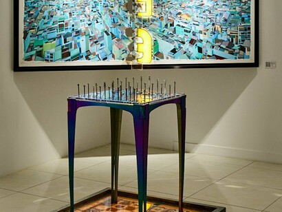 A glimpse of Buehner’s current exhibition — paintings, sculptures, and layered symbols invite you to step closer and look for what’s hidden