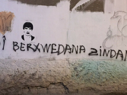 Long live the prison resistance - mural in North Kurdistan with a stencil of Mazlum Dogan, who died in prison 1982 @ ANF